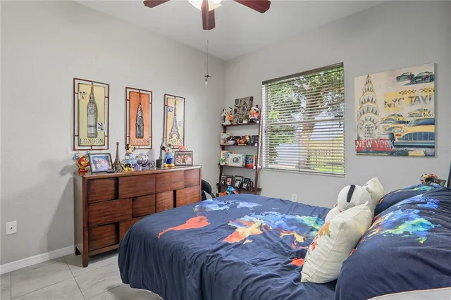 a bed room with a bed and a dresser