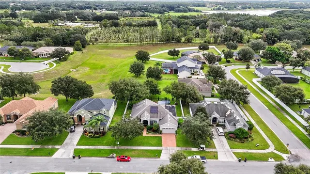 a view of yard with swimming pool and outdoor seating