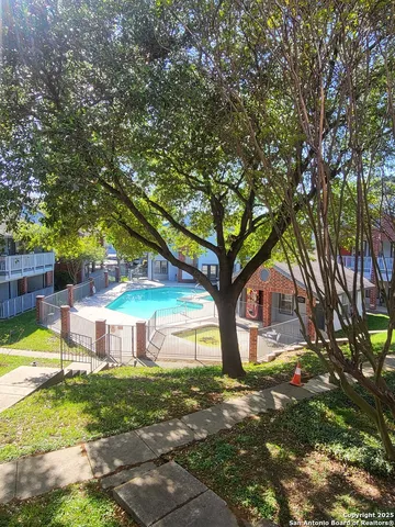 a house view with a garden space