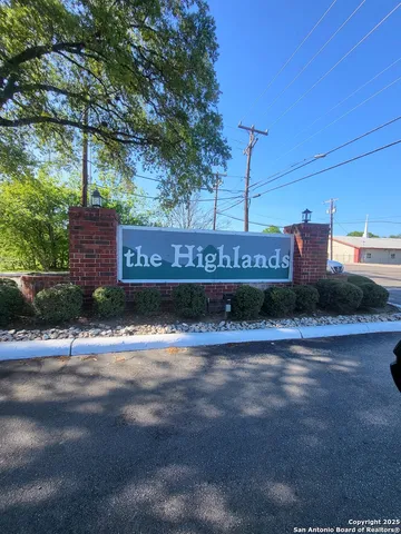 a sign on the side of a road