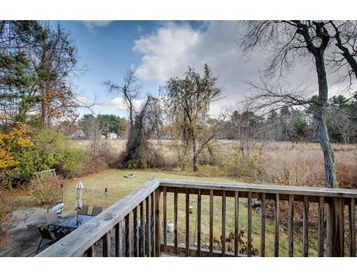10 Riverside Road Billerica, MA 01821 - Photo 20 of 28 a balcony with wooden floor and fence