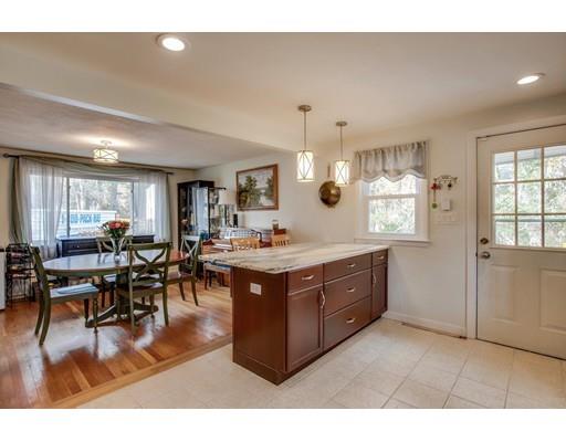10 Riverside Road Billerica, MA 01821 - Photo 6 of 28 a living room with stainless steel appliances kitchen island granite countertop lots of counter top space