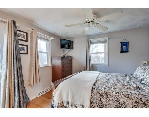 10 Riverside Road Billerica, MA 01821 - Photo 10 of 28 a bedroom with a large bed and a window