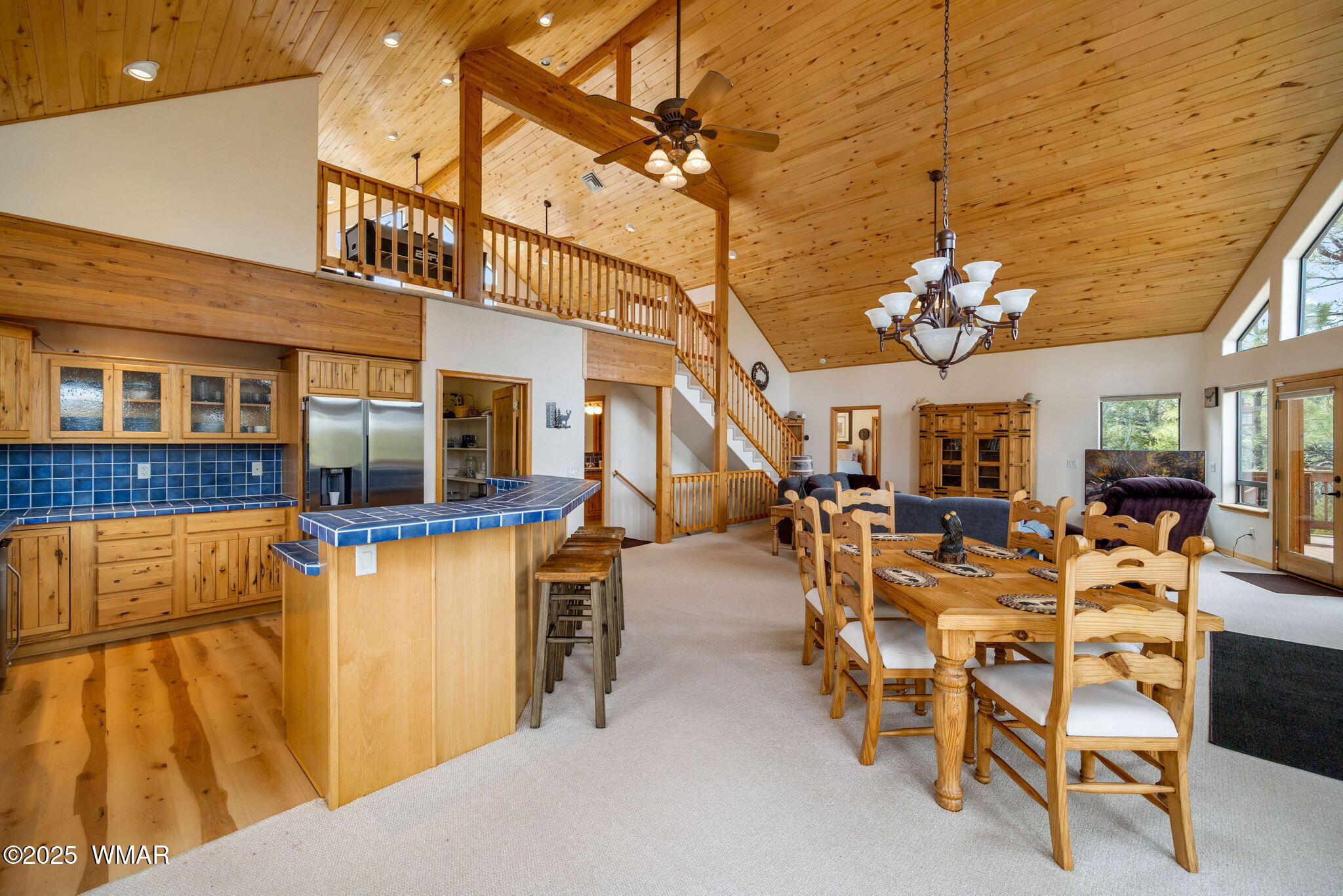 2851 Rockledge Road Heber, AZ 85928 - Photo 17 of 47 a view of a dining room with furniture and a chandelier