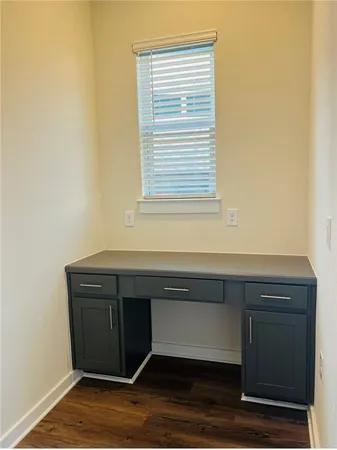 a bathroom with a toilet a sink and bathtub