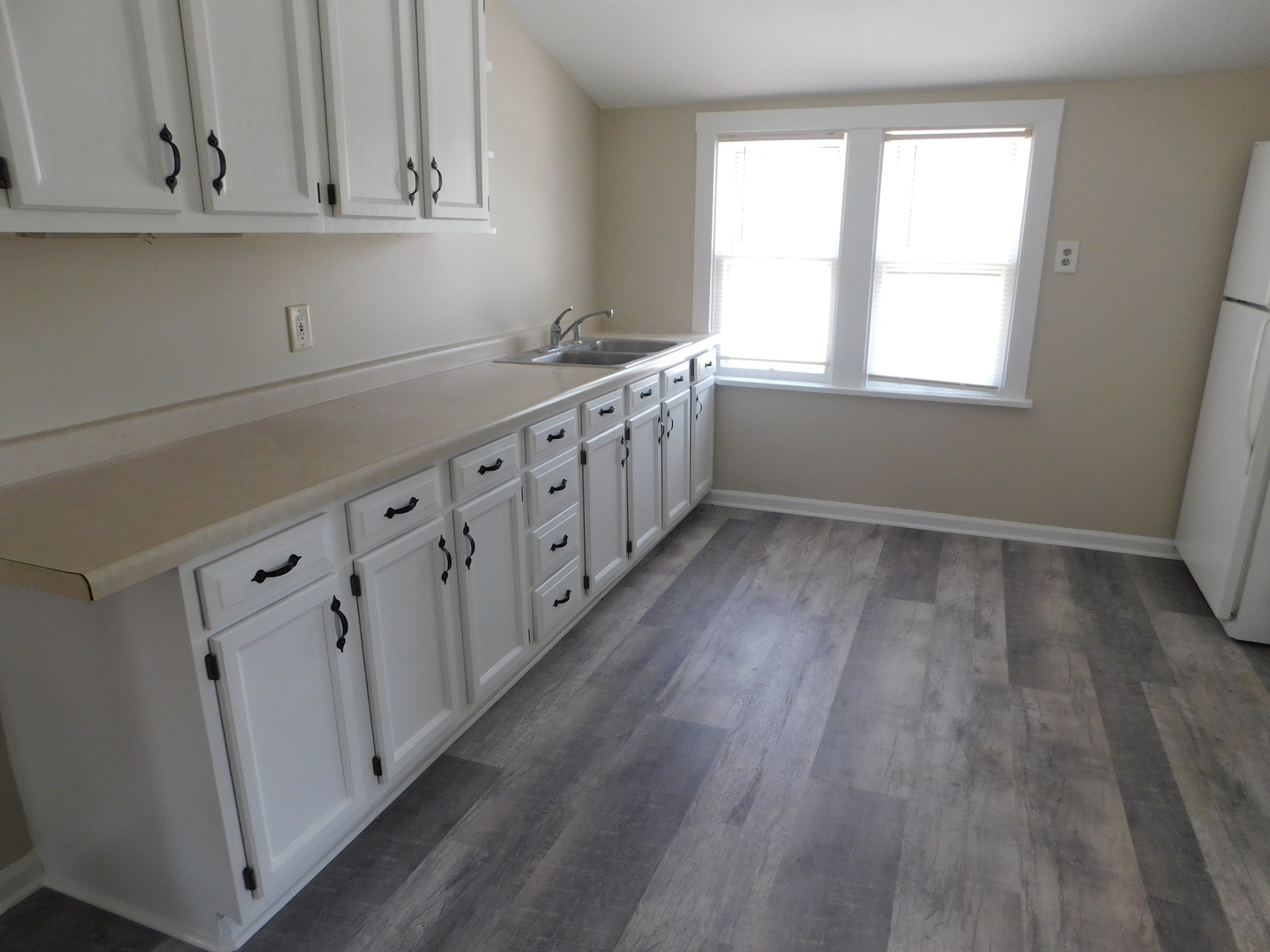 307 South Main Street Algonquin, IL 60102 - Photo 5 of 15 a kitchen with wooden cabinets and sink