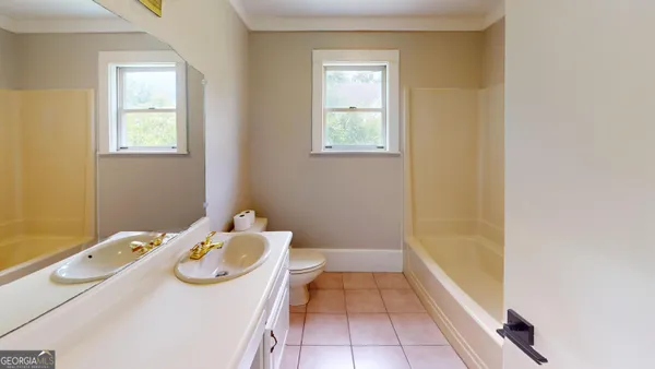 a bathroom with a sink and a bathtub