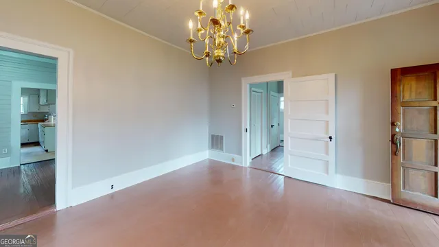 a view of livingroom with window and hardwood floor