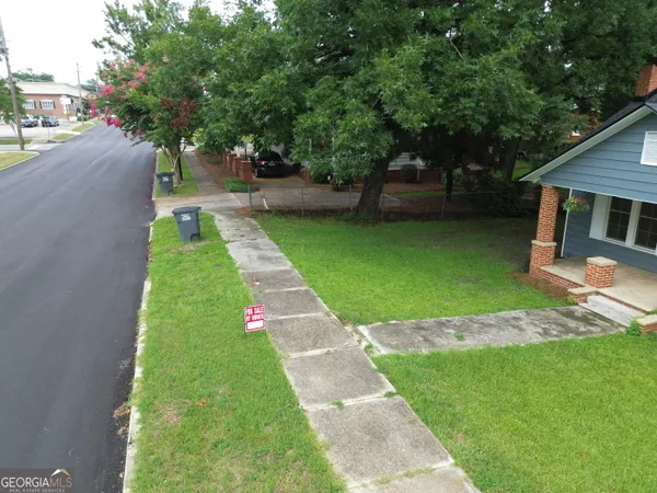 a view of a backyard with a garden
