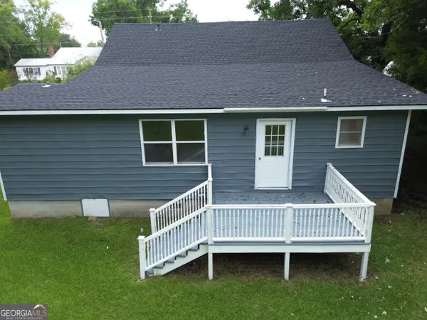 a view of a house with a deck