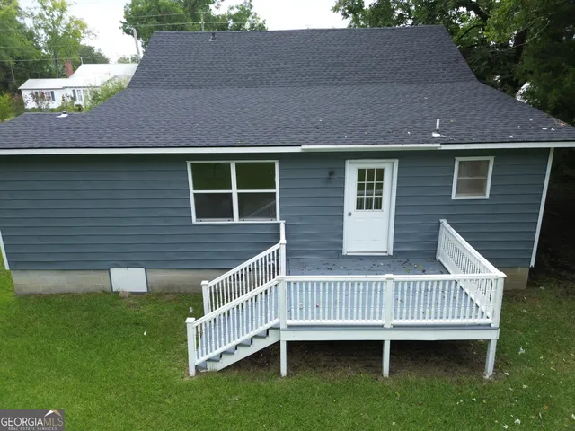a view of a house with a deck