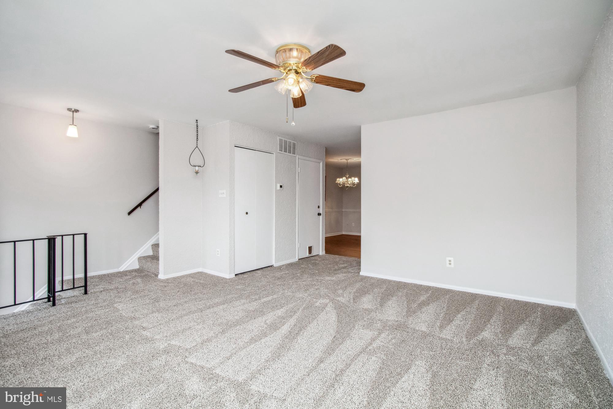 7909 Gray Haven Road Dundalk, MD 21222 - Photo 8 of 43 Large Open Living Room with fresh Carpet and Paint