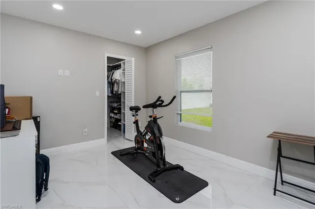 a view of a room with gym equipment