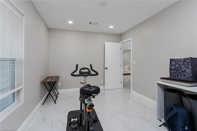 a view of a room with gym equipment