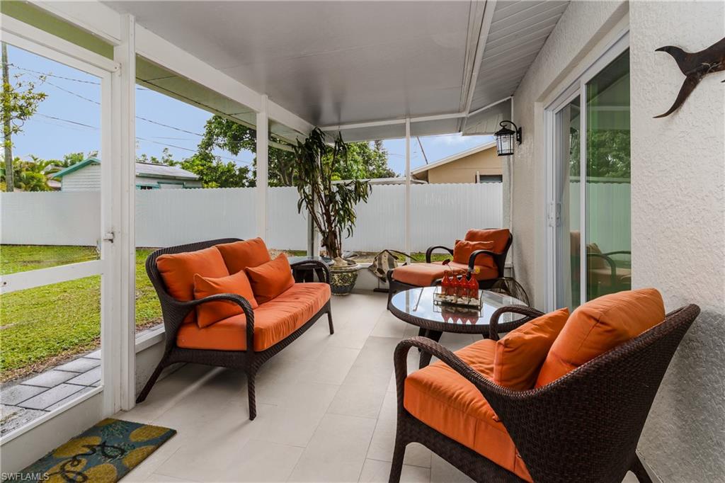 5170 19th Court Southwest Naples, FL 34116 - Photo 23 of 32 a outdoor living space with furniture and garden view