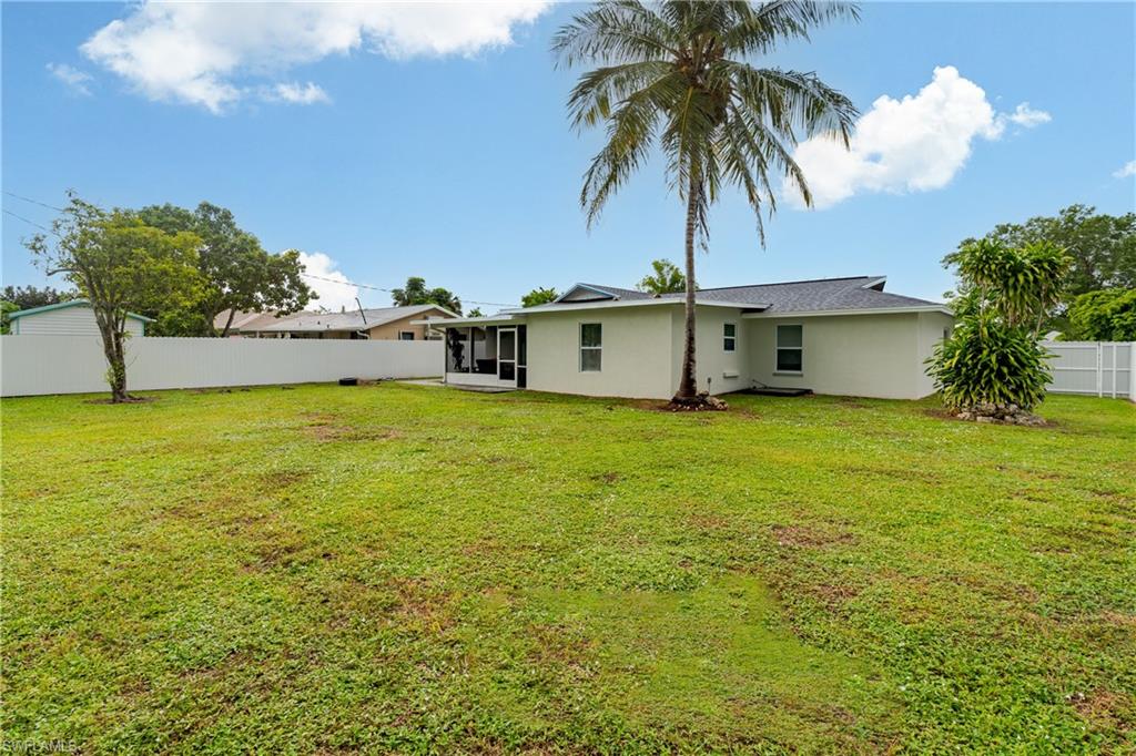 5170 19th Court Southwest Naples, FL 34116 - Photo 30 of 32 a view of a swimming pool and an outdoor space