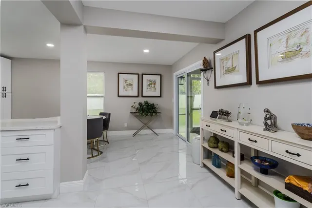 a view of a workspace with furniture