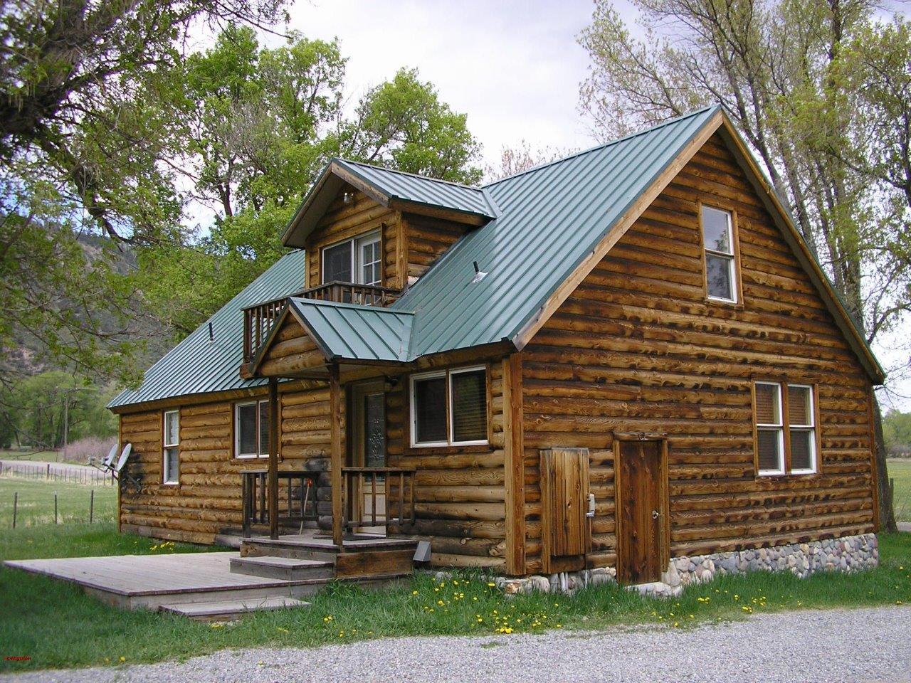2369 County Road 23 Ridgway, CO 81432 - Photo 1 of 12 a front view of a house with a yard