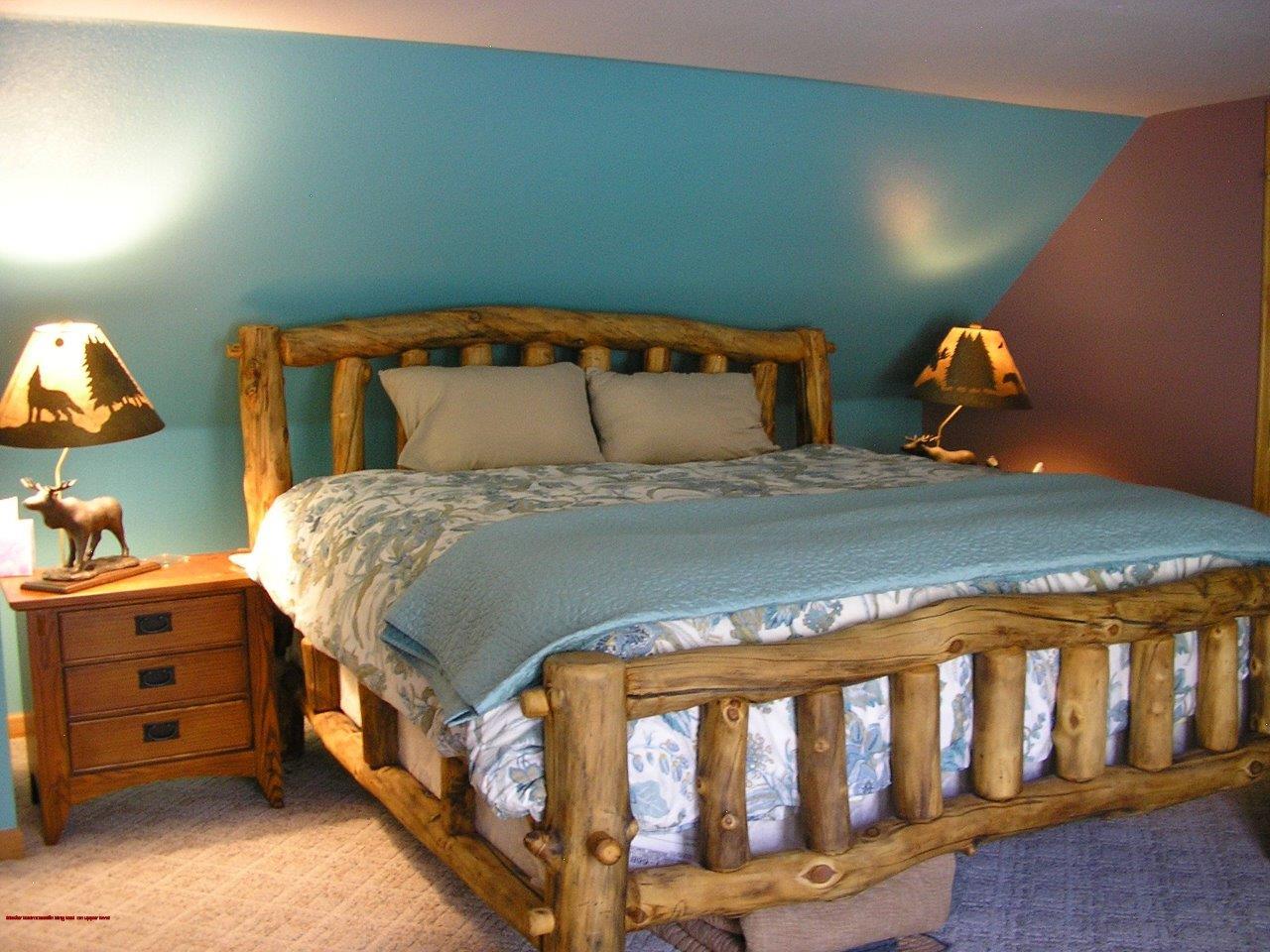 2369 County Road 23 Ridgway, CO 81432 - Photo 11 of 12 a bedroom with a bed and wooden floor