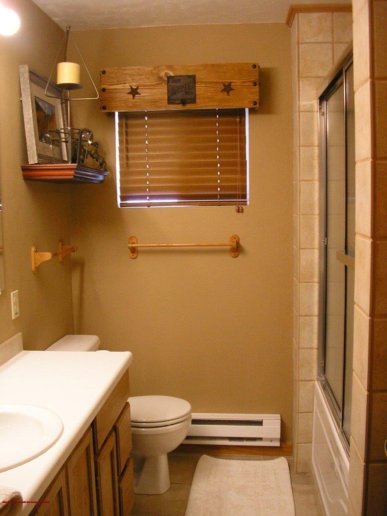 2369 County Road 23 Ridgway, CO 81432 - Photo 12 of 12 a bathroom with a toilet and a sink