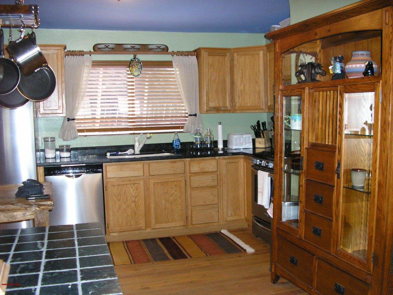 2369 County Road 23 Ridgway, CO 81432 - Photo 5 of 12 a kitchen with a sink and cabinets