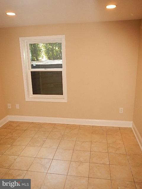 4406 Mahan Road Silver Spring, MD 20906 - Photo 9 of 12 an empty room with a window