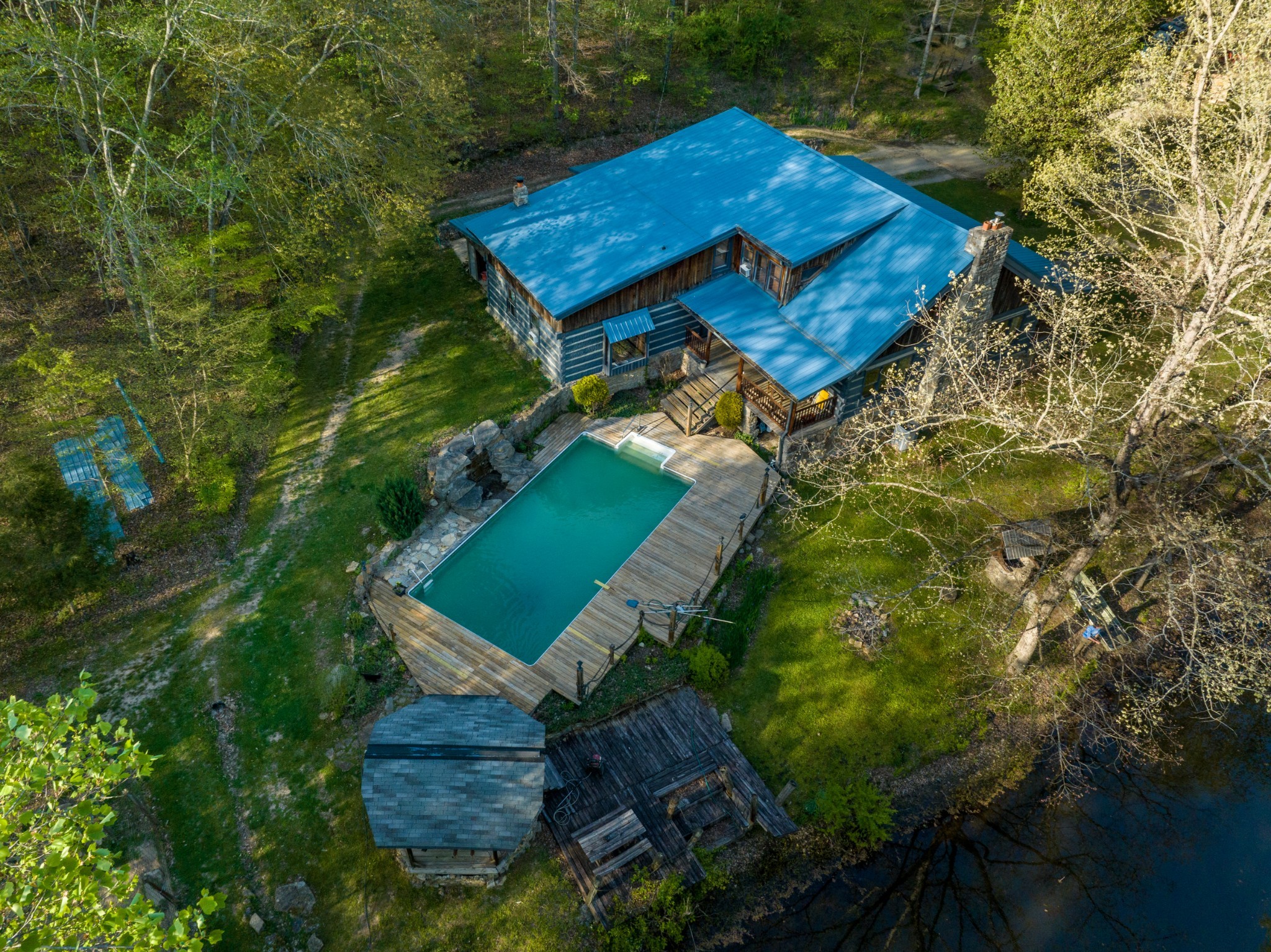 1056 West Sears Road Pegram, TN 37143 - Photo 13 of 61 an aerial view of a house with pool
