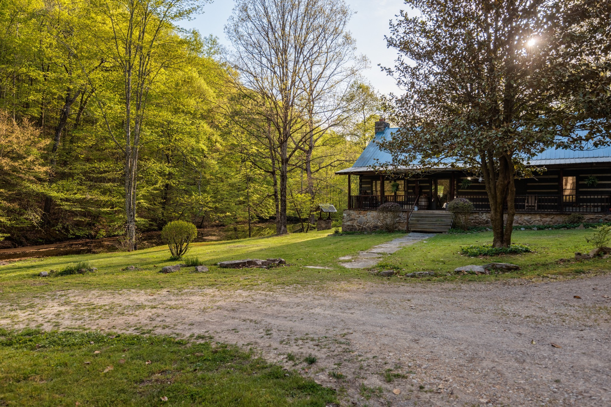 1056 West Sears Road Pegram, TN 37143 - Photo 19 of 61 a view of a house with a yard and tree