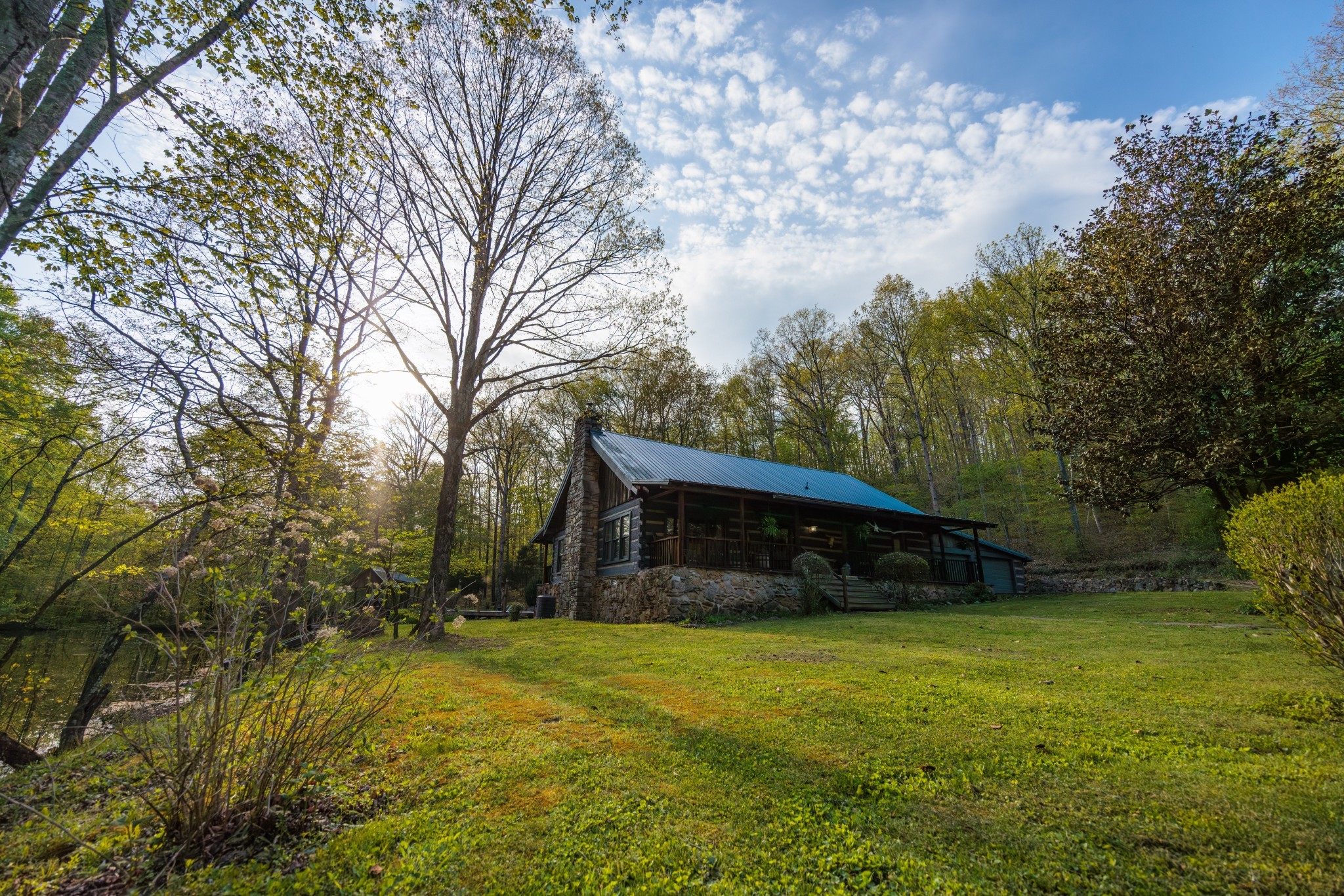 1056 West Sears Road Pegram, TN 37143 - Photo 20 of 61 a view of house with yard and a large tree