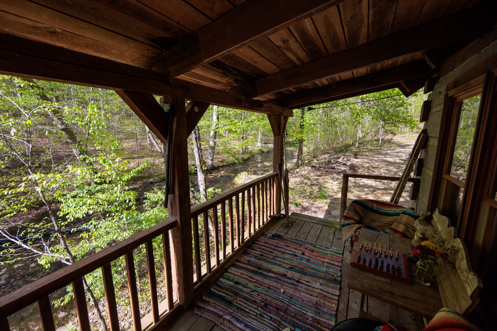 1056 West Sears Road Pegram, TN 37143 - Photo 27 of 61 a view of a porch with furniture and wooden floor