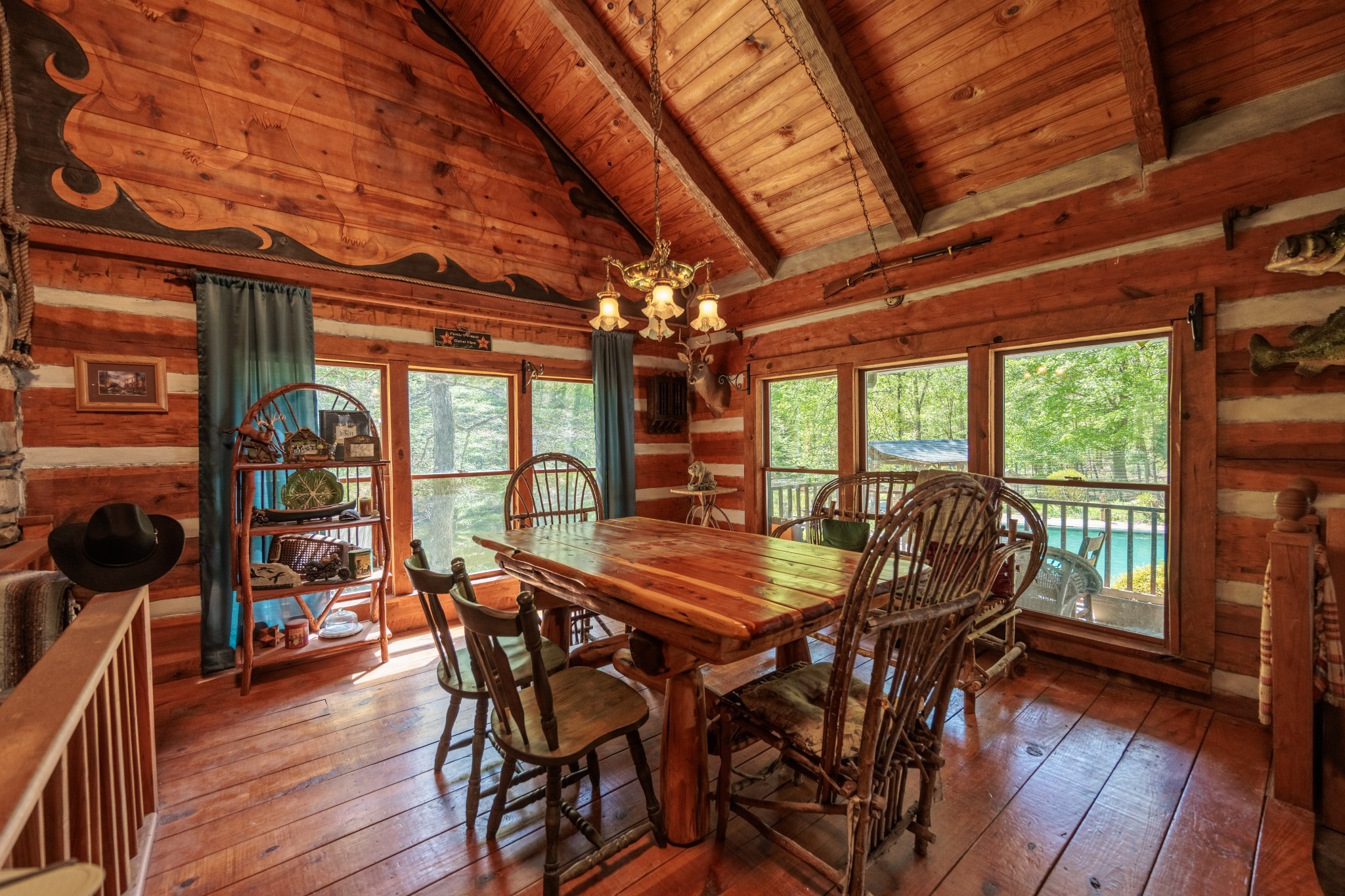 1056 West Sears Road Pegram, TN 37143 - Photo 35 of 61 a view of a dining room with furniture wooden floor and chandelier