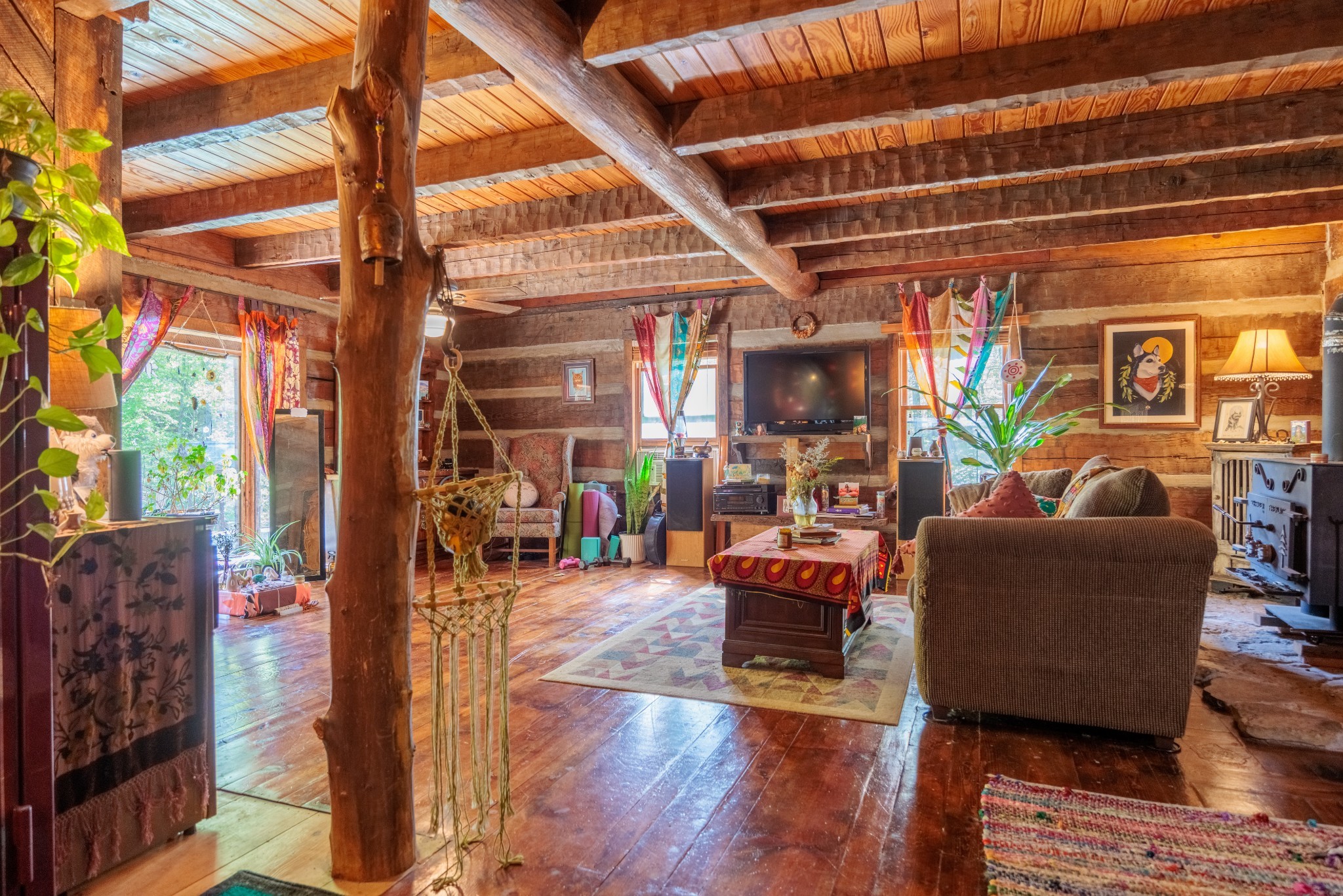 1056 West Sears Road Pegram, TN 37143 - Photo 53 of 61 a living room with furniture a wooden floor and next to a window