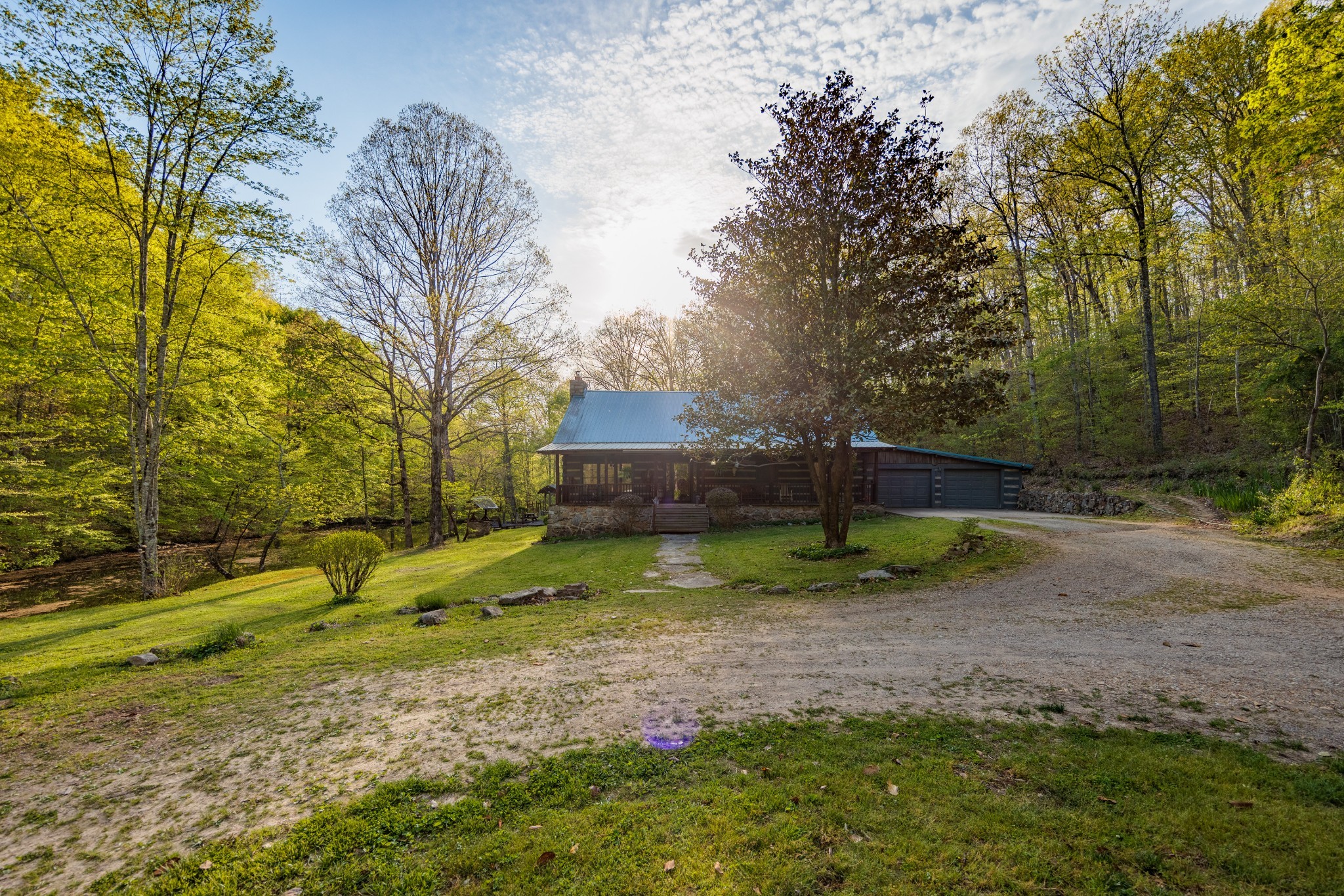 1056 West Sears Road Pegram, TN 37143 - Photo 7 of 61 a backyard of a house with lots of green space