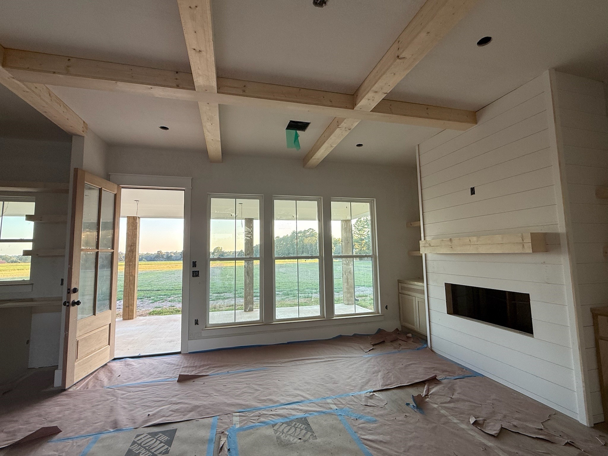 966 Jones Road New Waverly, TX 77358 - Photo 5 of 9 a living room with furniture and a fireplace