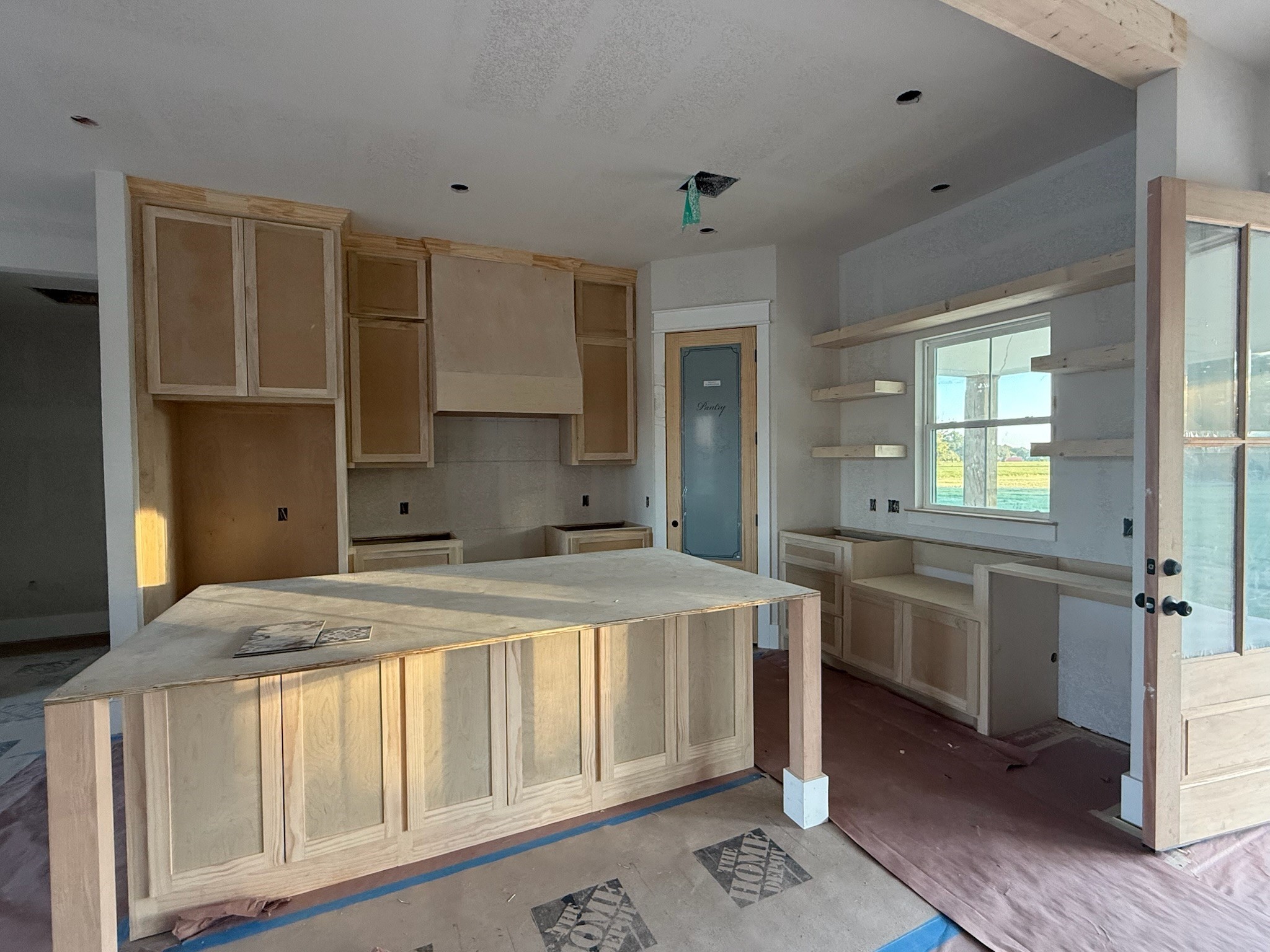 966 Jones Road New Waverly, TX 77358 - Photo 7 of 9 a kitchen with a stove a sink and a refrigerator