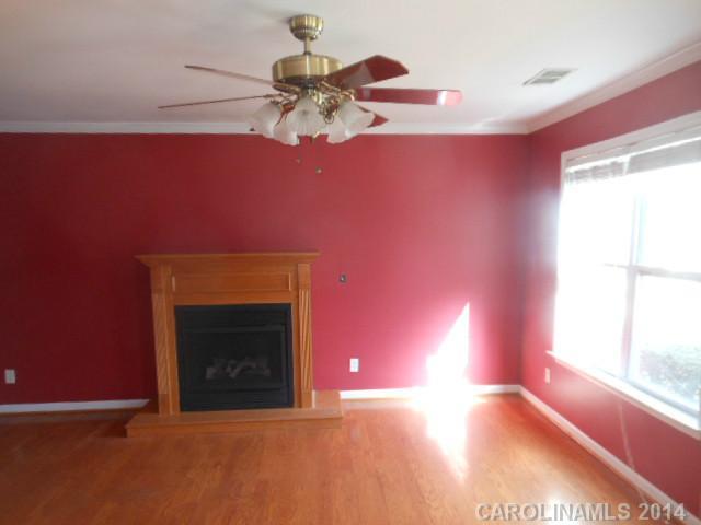 17311 Villanova Road, Unit 84 Huntersville, NC 28078 - Photo 3 of 14 a view of an empty room with a window