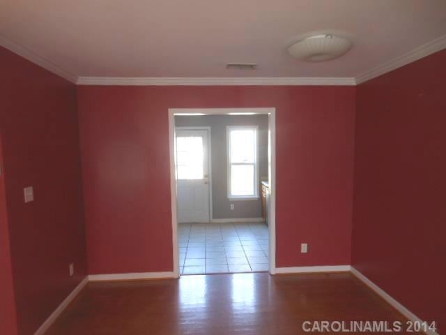 17311 Villanova Road, Unit 84 Huntersville, NC 28078 - Photo 6 of 14 a view of a livingroom with wooden floor