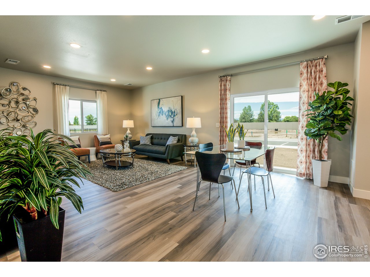 6609 4th St Road, Unit 6 Greeley, CO 80634 - Photo 12 of 29 EXAMPLE PHOTO: DINING ROOM & LIVING ROOM