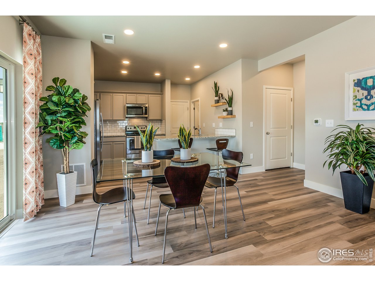 6609 4th St Road, Unit 6 Greeley, CO 80634 - Photo 13 of 29 EXAMPLE PHOTO: DINING ROOM & KITCHEN