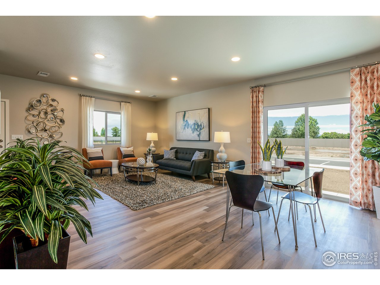 6609 4th St Road, Unit 6 Greeley, CO 80634 - Photo 9 of 29 EXAMPLE PHOTO: DINING ROOM & LIVING ROOM