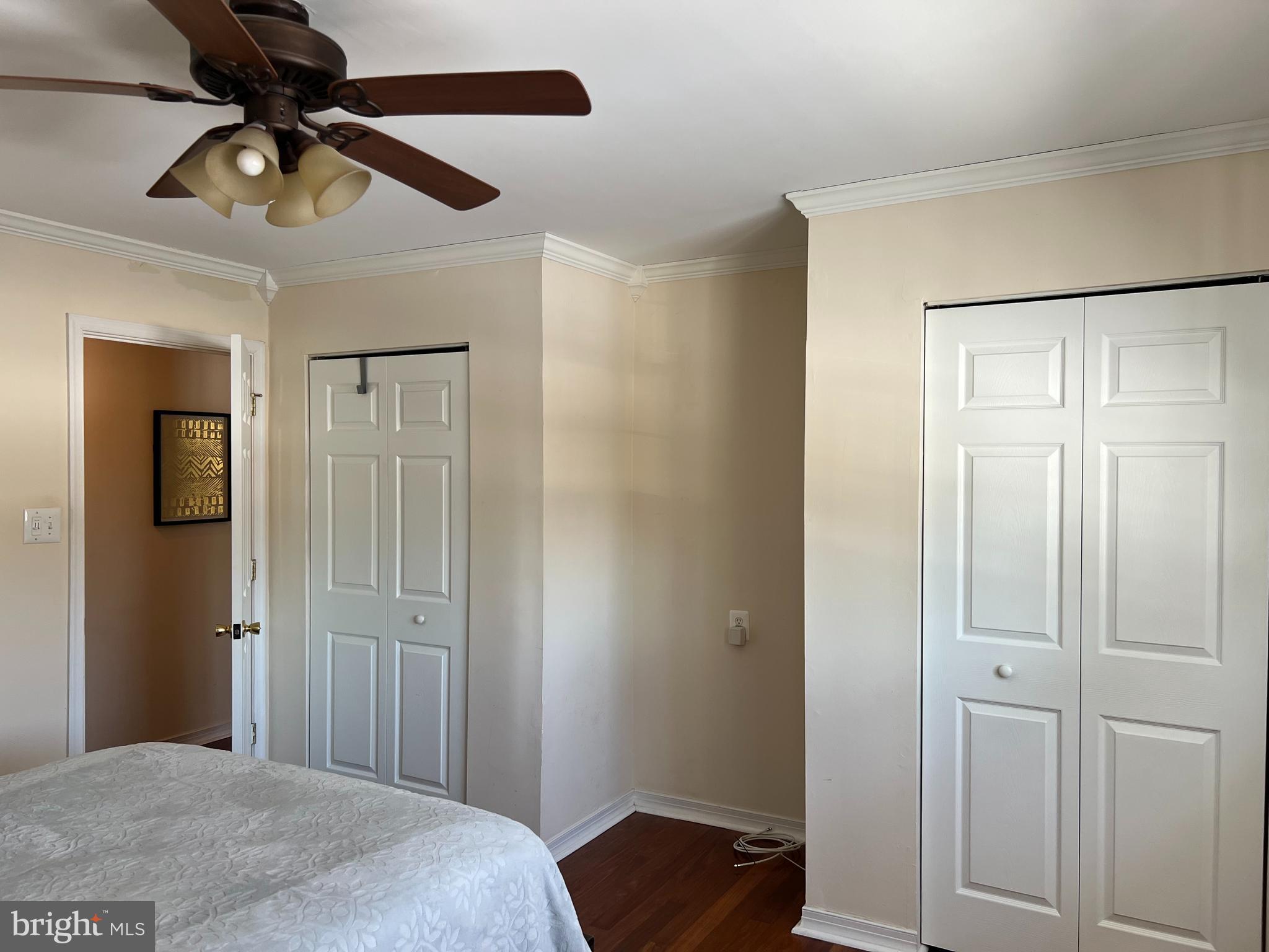 100 Eaves Mill Road Medford, NJ 08055 - Photo 11 of 16 a bedroom with a bed and a chandelier fan