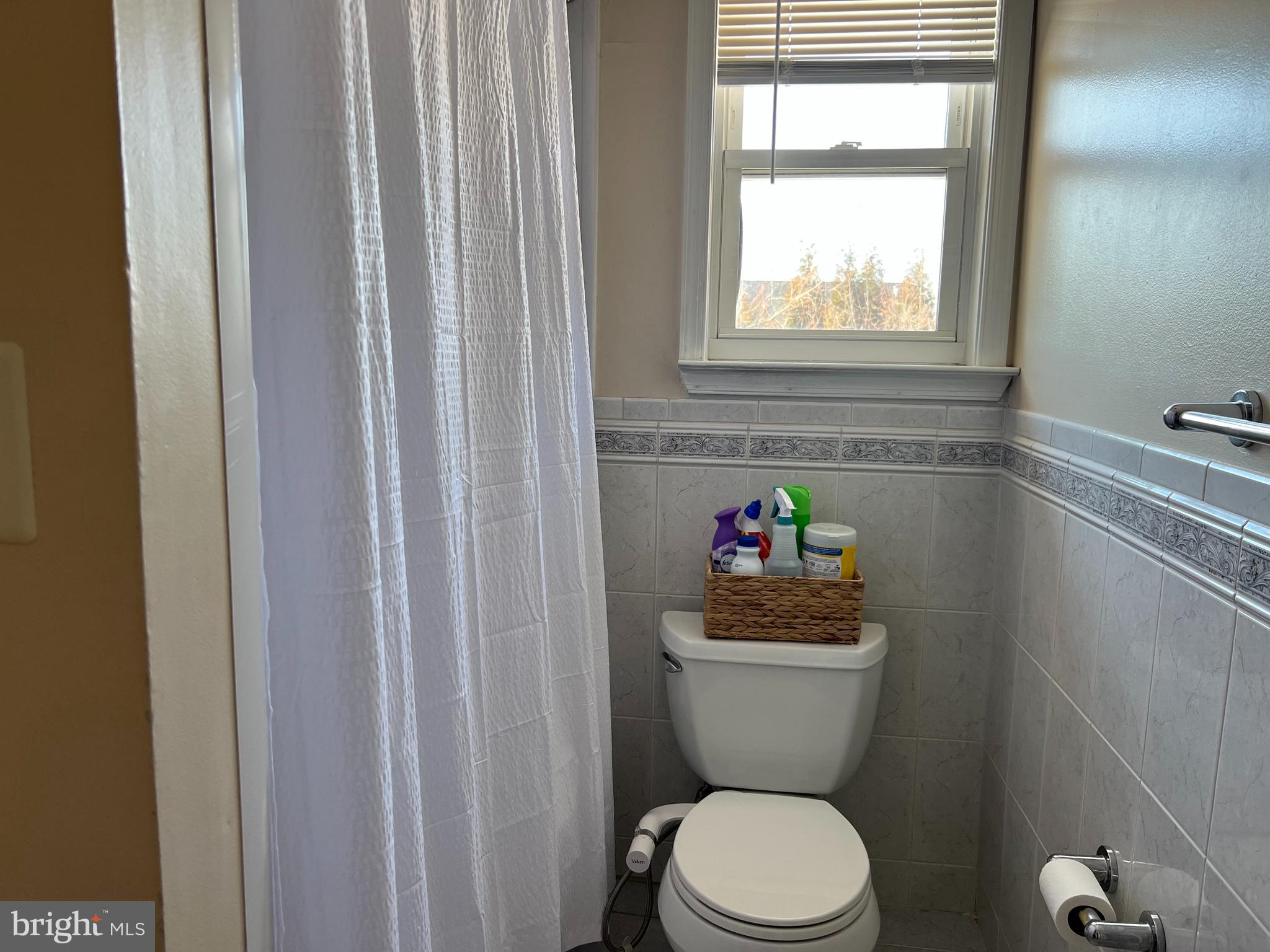 100 Eaves Mill Road Medford, NJ 08055 - Photo 14 of 16 a bathroom with a toilet and a window