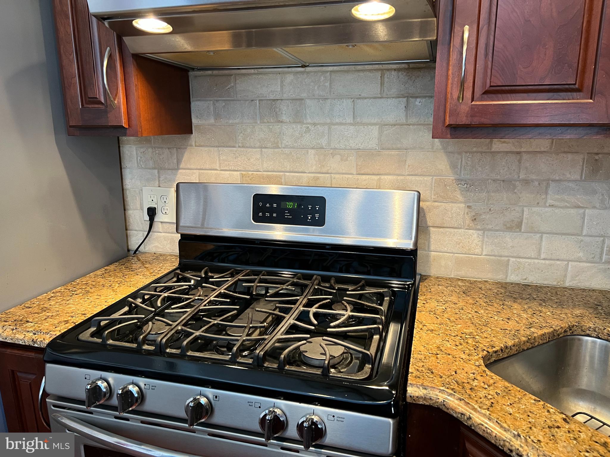 100 Eaves Mill Road Medford, NJ 08055 - Photo 3 of 16 a stove top oven sitting inside of a kitchen