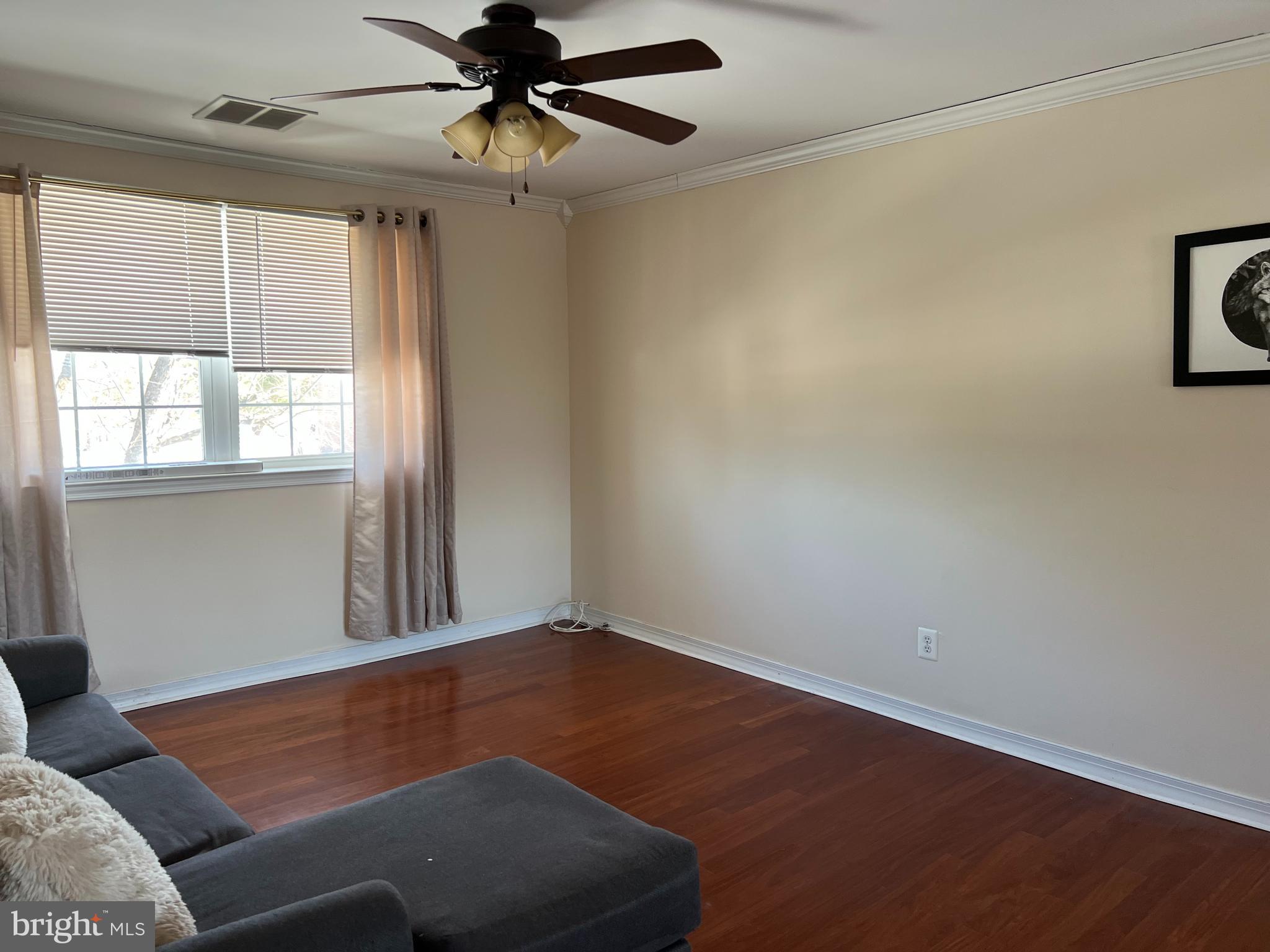 100 Eaves Mill Road Medford, NJ 08055 - Photo 9 of 16 a room with a wooden floor and windows