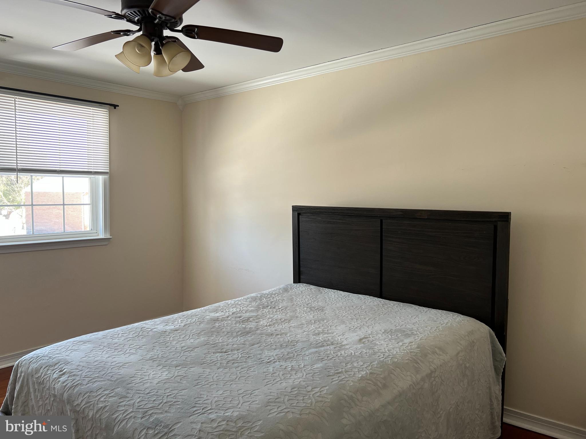 100 Eaves Mill Road Medford, NJ 08055 - Photo 10 of 16 a bedroom with a bed and a ceiling fan