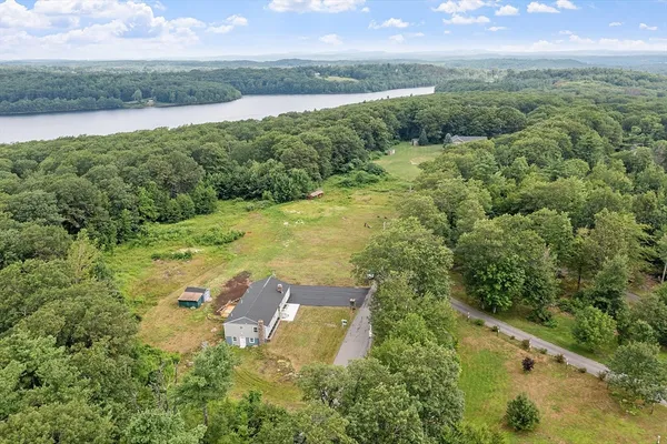 a view of lake with green space