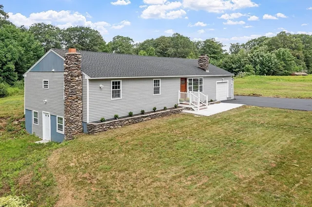 a view of balcony with wooden floor