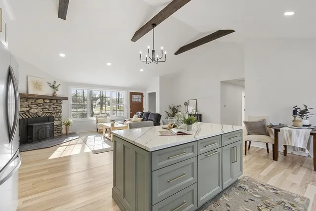 a view of a kitchen and dining room