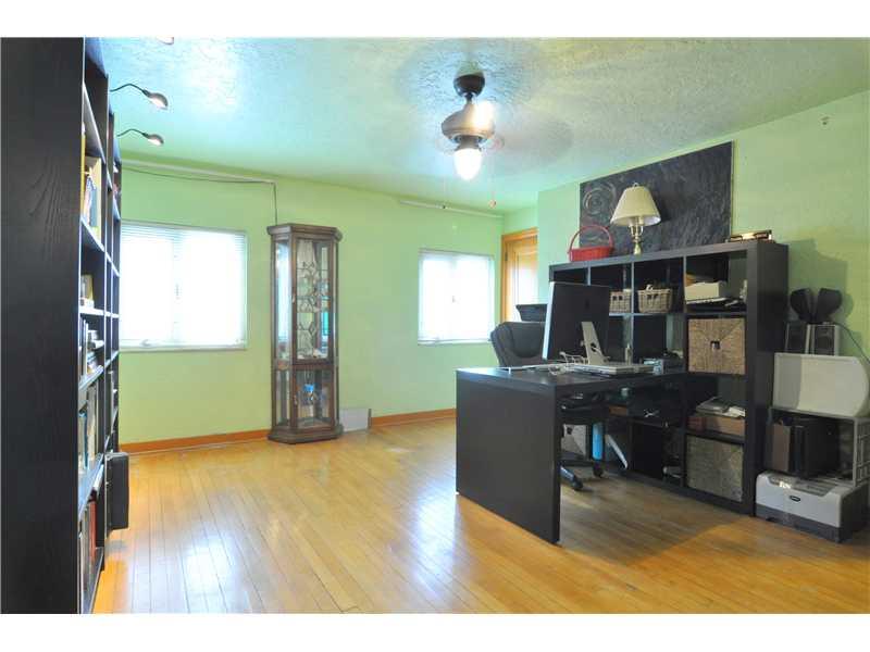 1103 13th Street McKees Rocks, PA 15136 - Photo 16 of 25 Den. A great space on the upper floor that can be used for an office, den, sitting area, or extra room for guests