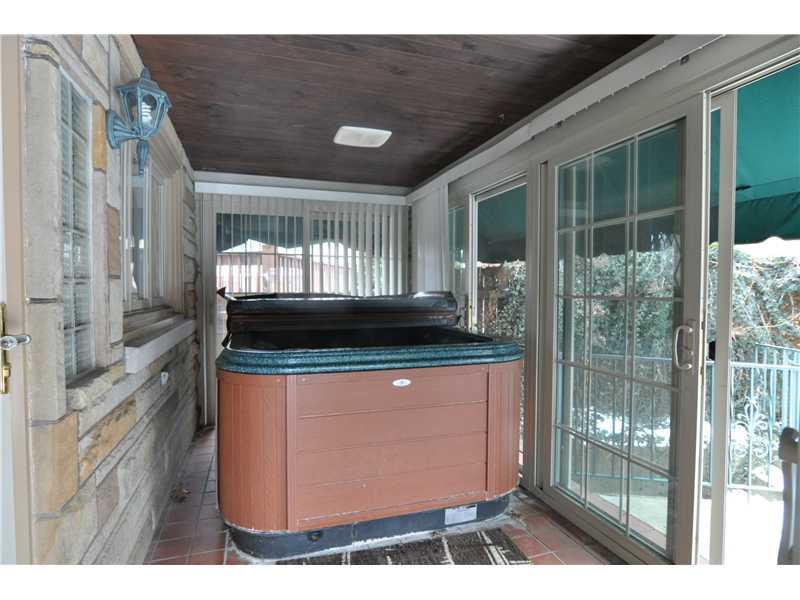 1103 13th Street McKees Rocks, PA 15136 - Photo 20 of 25 Swimming Pool/Hot Tub/Sauna. A great place for the hot tub... Keep the doors to the outside closed during the cold winter months, or open them to the stone patio in warmer weather!